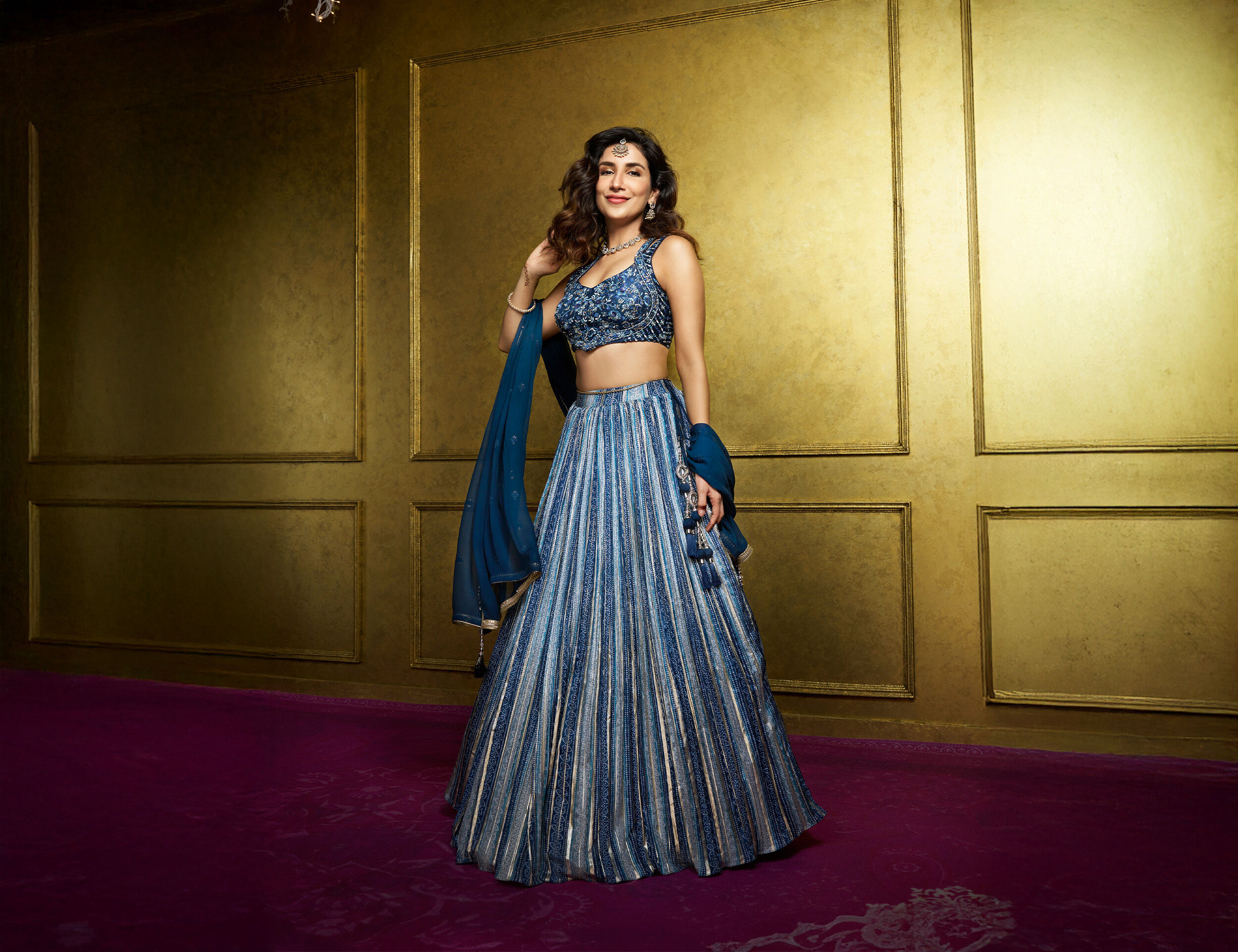 A women in beautifull elegant blue bridal lehenaga 